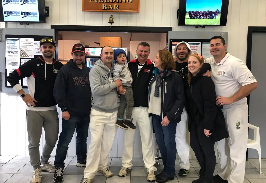 Players and families in the Fielding Bar celebrating Hector's 400th